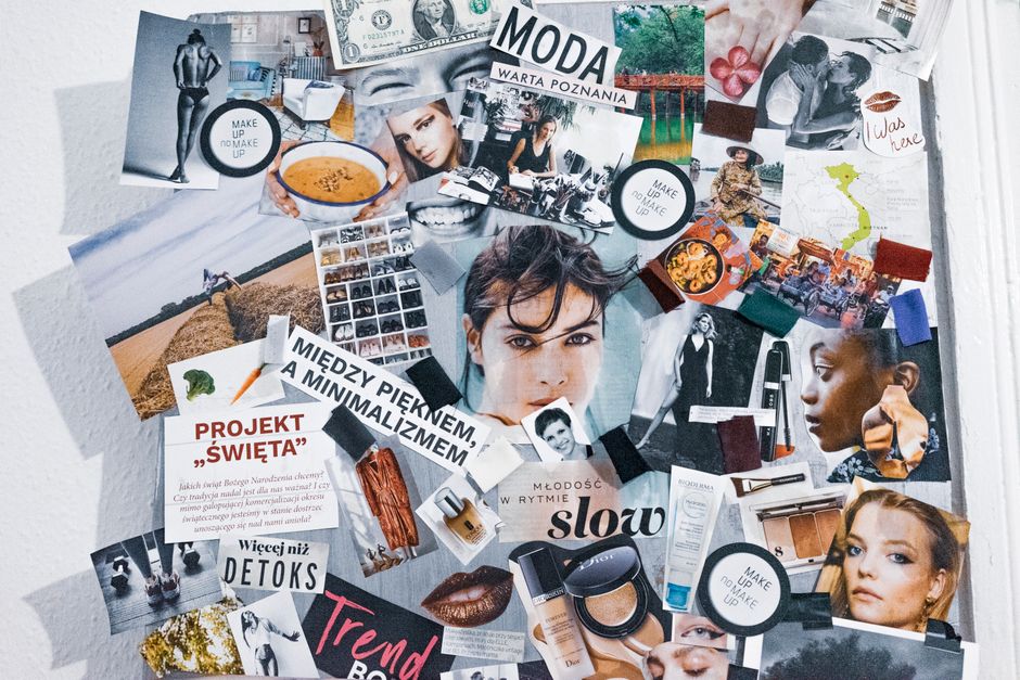 Pictures and articles from fashion magazines arranged in collage and hanging on wall